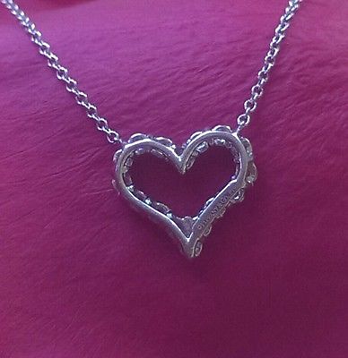 Vintage Tiffany & Co. Diamond Necklace. Save money off retail with this pre-loved diamond necklace.