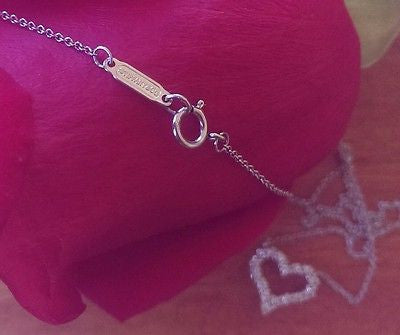 Pre Loved Tiffany & Co. Diamond Heart Pendant. Save money at Catherine Trenton Jewellery with Pre Loved Luxury.