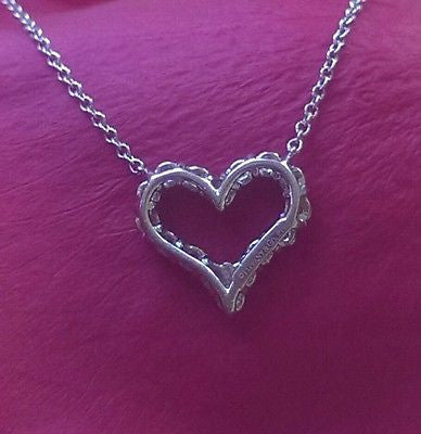 Pre Loved Tiffany & Co. Diamond Heart Pendant. Save money at Catherine Trenton Jewellery with Pre Loved Luxury.