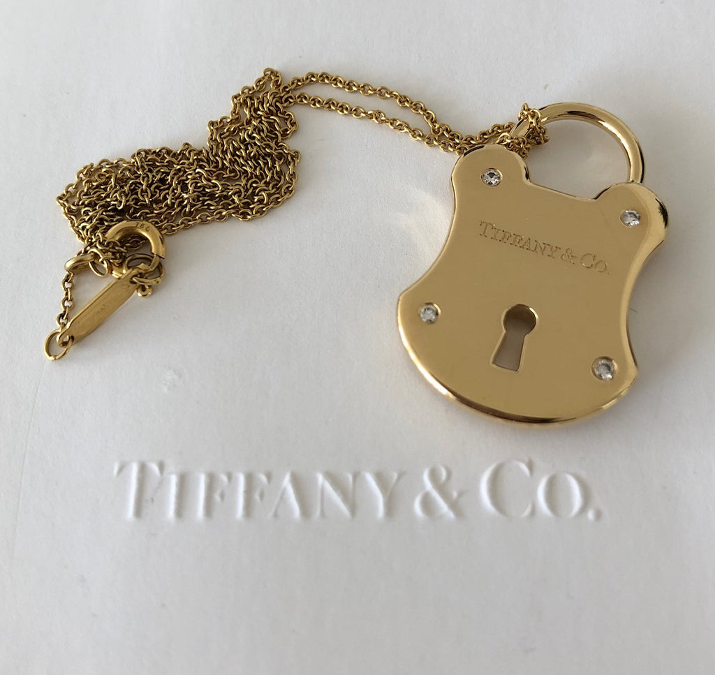 Tiffany and Co. Diamond Lock Pendant Set in Solid 18 Karat Yellow Gold at  1stDibs  gold tiffany lock necklace, tiffany and co gold lock necklace,  tiffany and co lock pendant necklace
